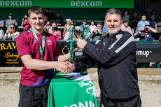 Shane Lally is presented with the trophy by John Fitzmaurice 24/4/2024