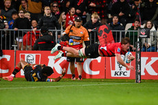 Cullen Grace scores a try in the tackle of Emoni Narawa 26/3/2024