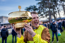 Paul Townend celebrates with the Paddy Power Irish Gold Cup after winning with Galopin Des Champs 3/2/2024