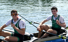 Philip Doyle and Daire Lynch celebrate winning bronze medals 10/9/2023