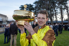 Paul Townend celebrates with the Paddy Power Irish Gold Cup after winning with Galopin Des Champs 3/2/2024