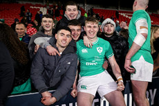 Finn Treacy celebrates with his friends after the game 9/2/2024