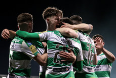 Darragh Burns celebrates scoring his side’s second goal with teammates 29/3/2024