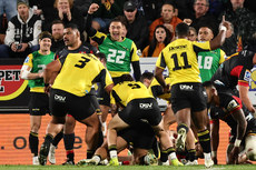 Hurricanes players celebrate a try 24/5/2024