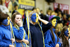 Dejected fans of Christ King look on during the final moments of the game 19/3/2013