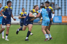 Scott Gregory  is tackled by Stafford McDowall 27/4/2024