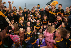 Dr. Crokes players and supporters celebrate at the end of the game with the trophy 27/10/2024