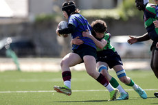 Robbie McArdle is tackled by Eoin Healy 24/4/2024