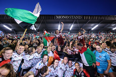 Both teams celebrate in front of the Mono Stand after Palestine win at Dalymount Park 15/5/2024