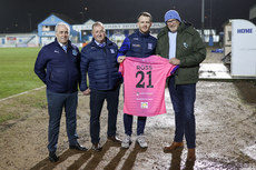 Paul Ross, Dad of Lydia Ross, who sadly lost her life earlier this year, accepts a Newry City jersey from the club 9/2/2024