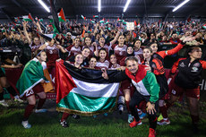 The Palestine team and Manager Nasser Dahbour celebrate with a Palestine flag in front of the Mono stand 15/5/2024