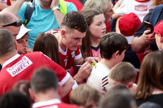 Eoin Roche signs autographs after the game 19/5/2024