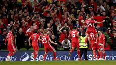 Harry Wilson celebrates scoring their first goal with teammates 16/10/2018