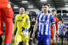 Darren King and Sean O'Neill lead their teams onto the pitch 9/2/2024