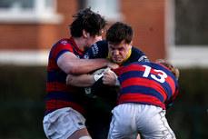 Declan Horrox is tackled by JJ O’Dea and Hugh Cooney 10/2/2024