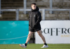 Ruairi Canavan inspects the pitch ahead of the game 10/11/2024