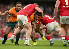 Len Ikitau is tackled by Dewi Lake and Jac Morgan 17/11/2024