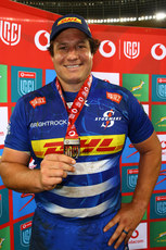 Neethling Fouchee is presented with the player of the match award 27/4/2024