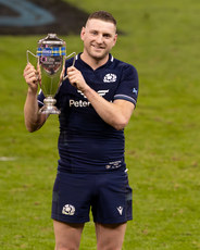 Finn Russell with the Doddie Weir Cup after the game 3/2/2024