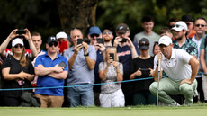 Rory McIlroy lines up his putt on the 2nd green 10/9/2023