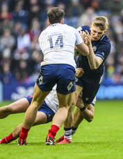 Harry Paterson is tackled by Damian Penaud 10/2/2024