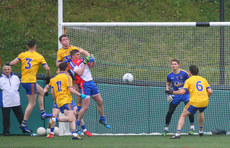 Players battle for the loose ball in front of the net of Geoffrey Claffey 1/5/2016