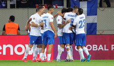 Anastasios Bakasetas celebrates scoring his sides first goal with teammates 13/10/2024