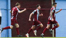 Hayden Cann celebrates after scoring his side's second goal of the match with Andrew Quinn and Adam Foley  6/5/2024