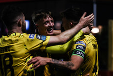 Joe Redmond celebrates after scoring his side's third goal of the match with Aidan Keena and Chris Forrester 14/10/2024