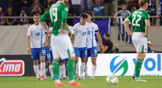 Petros Mantalos celebrates scoring his sides second goal with teammates 13/10/2024