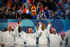 The French fans and team celebrate after winning gold 7/9/2024