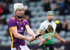 Conal O'Riain shoots to score his side's first goal of the match 13/10/2024