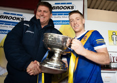 Ian Hanrahan receives the Tom Callanan cup from Claude Geoghegan 10/11/2024