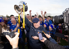 Tommy Kelly celebrates with the cup 10/11/2024