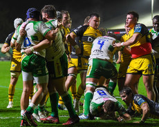 Lorenzo Cannone celebrates after scoring a try with teammates 19/10/2024