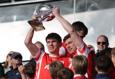 Michael Fitzsimons and John Fitzsimons lift the trophy 20/10/2024 