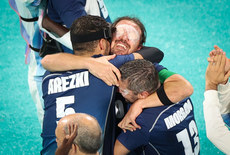 Frederic Villeroux celebrates with teammates Hakim Arezki and Fabcrice Morgado after winning gold 7/9/2024