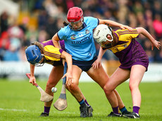 Emma Moran in action against Emma O'Leary and Roisin McGonigle 27/4/2024