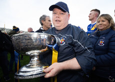 Tommy Kelly celebrates with the cup 10/11/2024