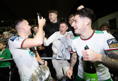 Charlie Lyons and Ruairi Keating celebrate with fans after the game 18/10/2024