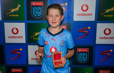 A young Vodacom Bulls fan with the referees whistle and match coin 11/5/2024