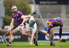 Sean Harkness challenge for the ball with Padhraic Linehan and Michael Roche 13/10/2024