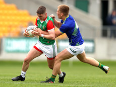 Dara Hurley is tackled by Darragh O'Connor 25/6/2022