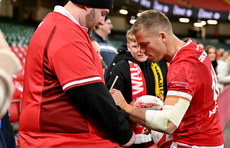 Gareth Anscombe signs autographs after the game 17/11/2024