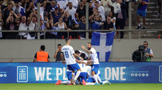 Anastasios Bakasetas celebrates scoring his sides first goal with teammates 13/10/2024