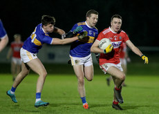 Sean Meehan is tackled by Cathal Kennedy and Liam Boland 2/1/2020