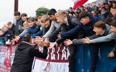 Daire Doyle high fives the fans after the game 6/5/2024