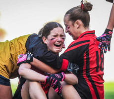 Sophia Kennedy (centre) celebrates winning with teammates Faye Greenhalgh and Jessica Butler 21/10/2024