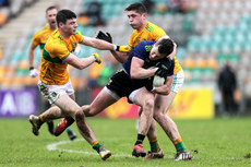 Cillian O’Connor is tackled by Donal Casey and Jack Gilheaney 1/11/2020