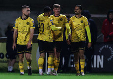 Chris Forrester celebrates after scoring his side's first goal of the match with Jake Mulraney and Zachary Elbouzedi 14/10/2024